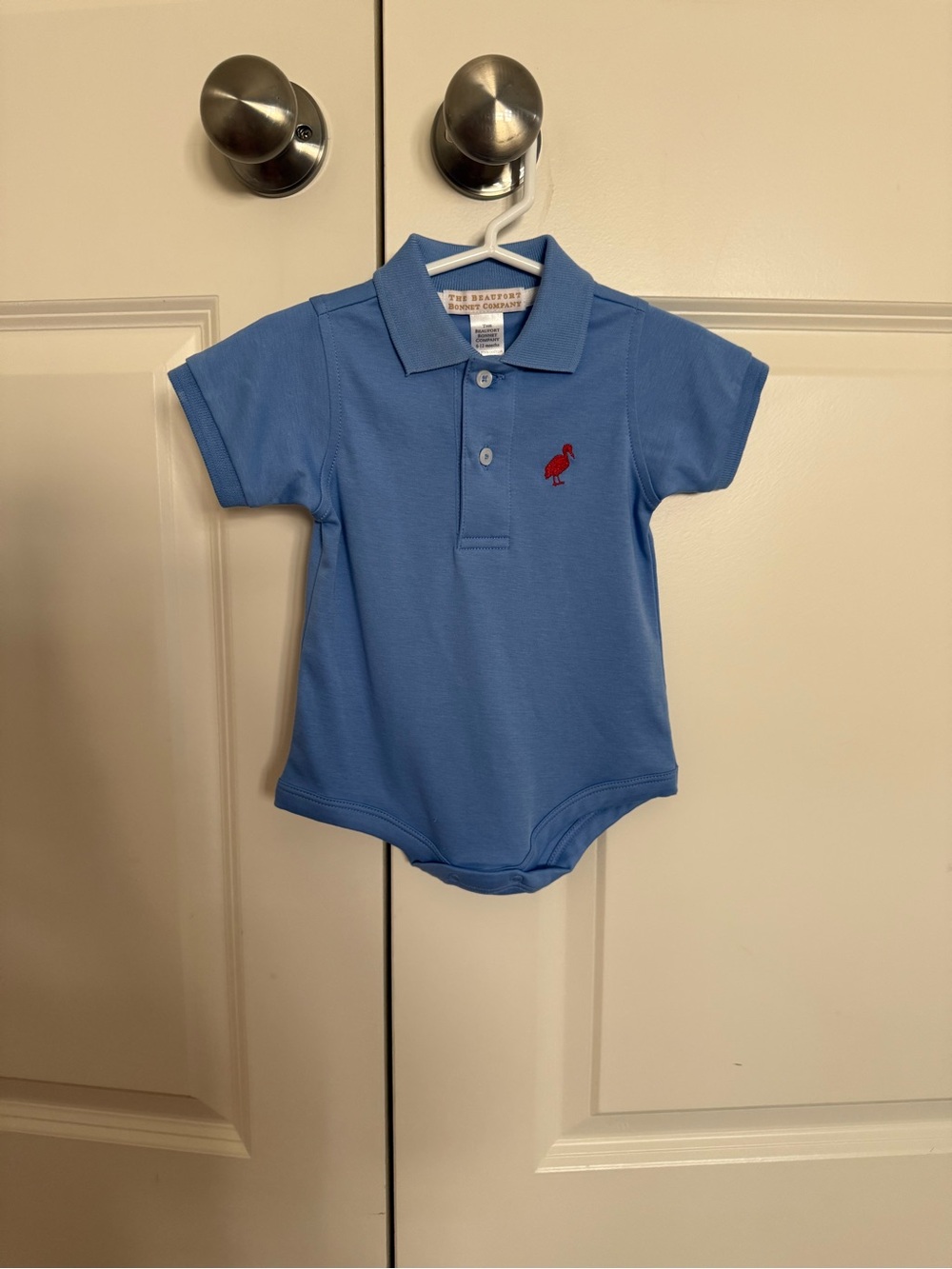 The Beaufort Bonnet Company Blue Polo Onesie with Red Embroidered Logo